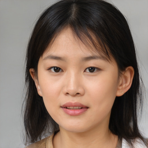 Neutral asian young-adult female with medium  brown hair and brown eyes