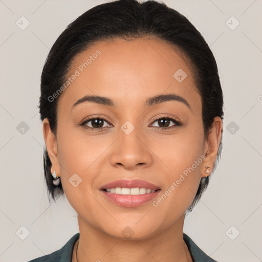 Joyful white young-adult female with medium  black hair and brown eyes