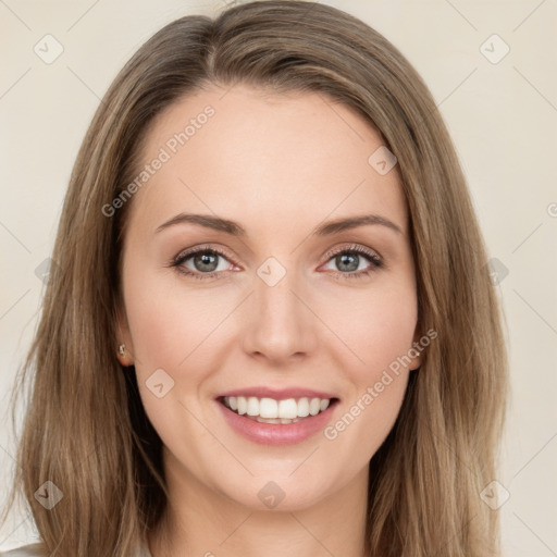 Joyful white young-adult female with long  brown hair and green eyes