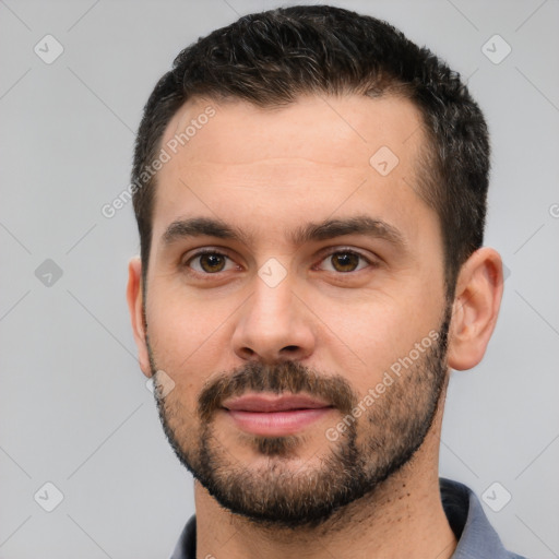 Neutral white young-adult male with short  brown hair and brown eyes