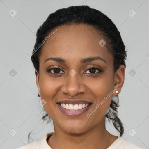 Joyful latino young-adult female with short  black hair and brown eyes