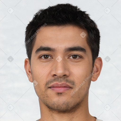 Neutral latino young-adult male with short  black hair and brown eyes