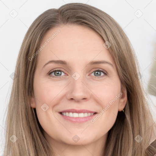 Joyful white young-adult female with long  brown hair and grey eyes