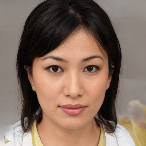 Neutral asian young-adult female with medium  brown hair and brown eyes