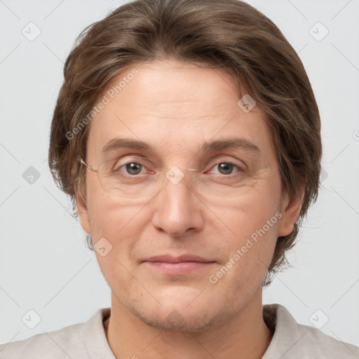 Joyful white adult female with short  brown hair and grey eyes