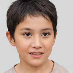 Joyful white child female with short  brown hair and brown eyes