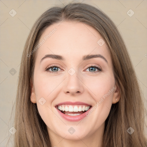 Joyful white young-adult female with long  brown hair and grey eyes