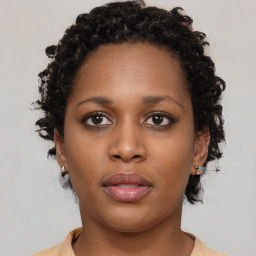 Neutral black young-adult female with short  brown hair and brown eyes