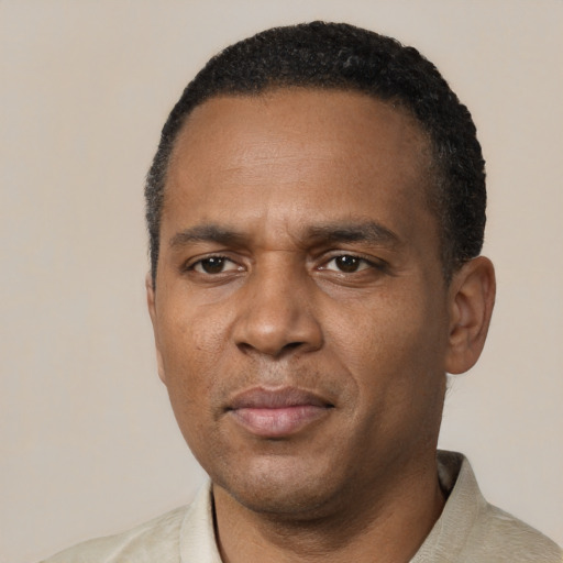 Neutral black adult male with short  black hair and brown eyes