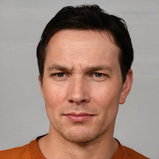 Neutral white adult male with short  brown hair and brown eyes