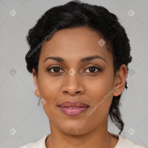 Joyful latino young-adult female with short  brown hair and brown eyes