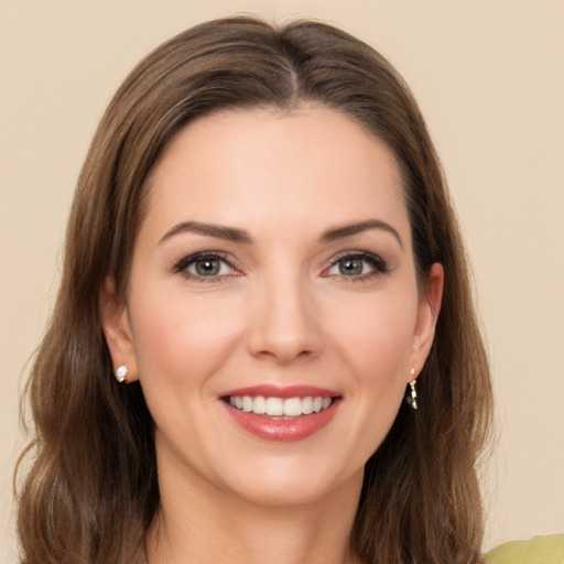 Joyful white young-adult female with medium  brown hair and brown eyes