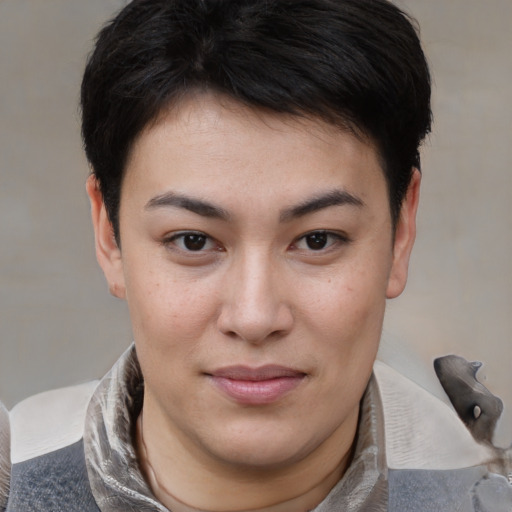 Joyful asian young-adult female with short  brown hair and brown eyes