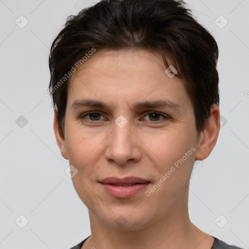 Joyful white young-adult female with short  brown hair and brown eyes