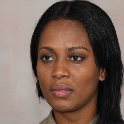 Neutral black adult female with medium  black hair and brown eyes