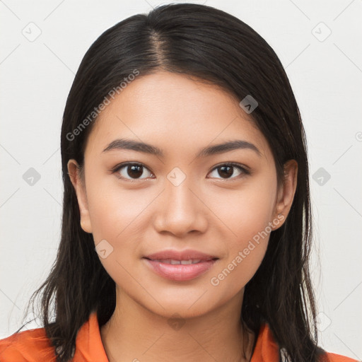 Joyful asian young-adult female with long  brown hair and brown eyes