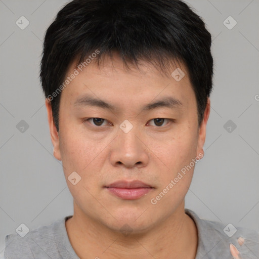 Neutral asian young-adult male with short  brown hair and brown eyes