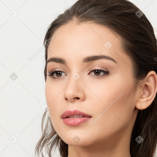 Neutral white young-adult female with long  brown hair and brown eyes