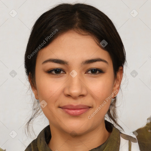 Joyful latino young-adult female with medium  brown hair and brown eyes