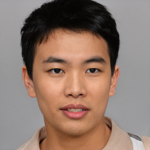 Neutral asian young-adult male with short  brown hair and brown eyes