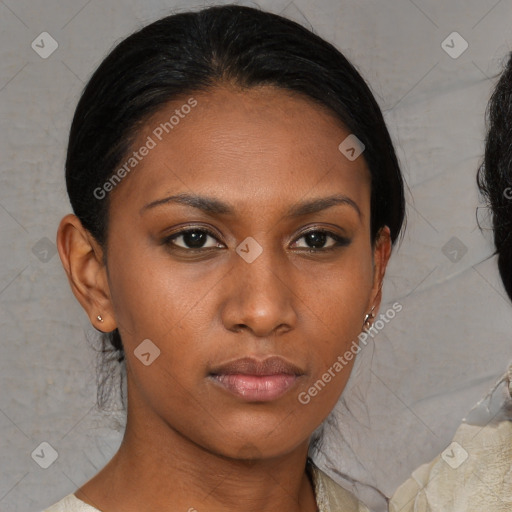 Neutral black young-adult female with medium  brown hair and brown eyes