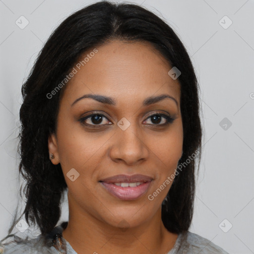 Joyful black young-adult female with medium  brown hair and brown eyes