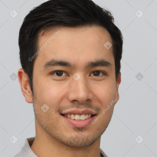 Joyful latino young-adult male with short  brown hair and brown eyes