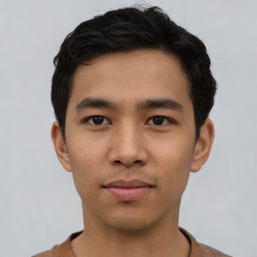 Neutral asian young-adult male with short  black hair and brown eyes