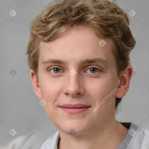 Joyful white young-adult female with short  brown hair and blue eyes