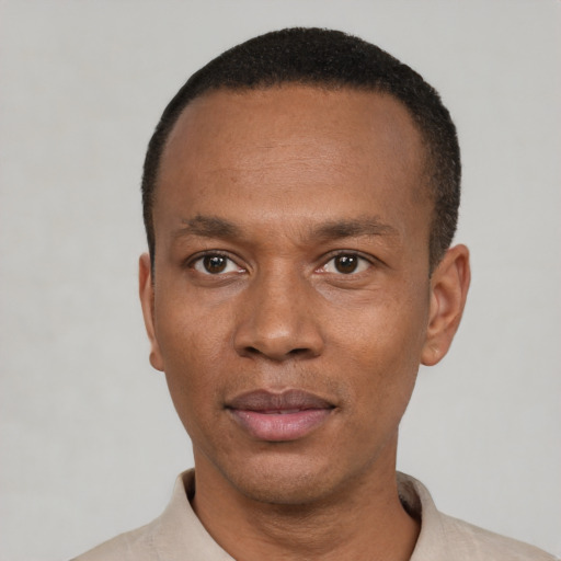 Neutral black adult male with short  black hair and brown eyes