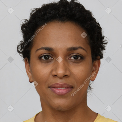 Joyful black young-adult female with short  brown hair and brown eyes