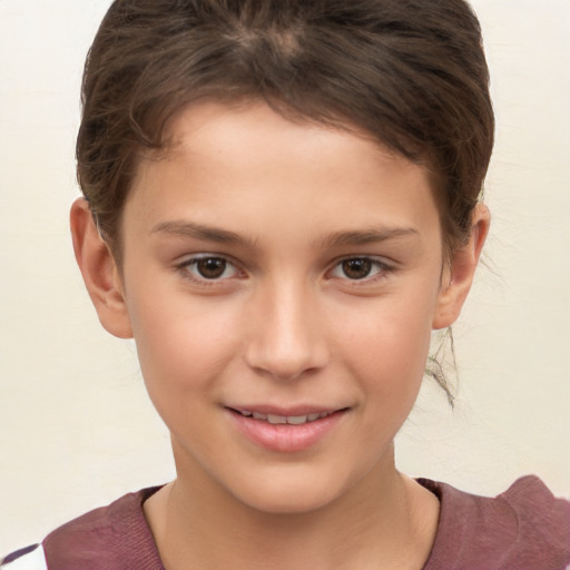 Joyful white child female with short  brown hair and brown eyes