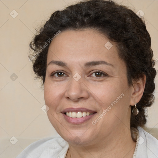 Joyful white adult female with short  brown hair and brown eyes