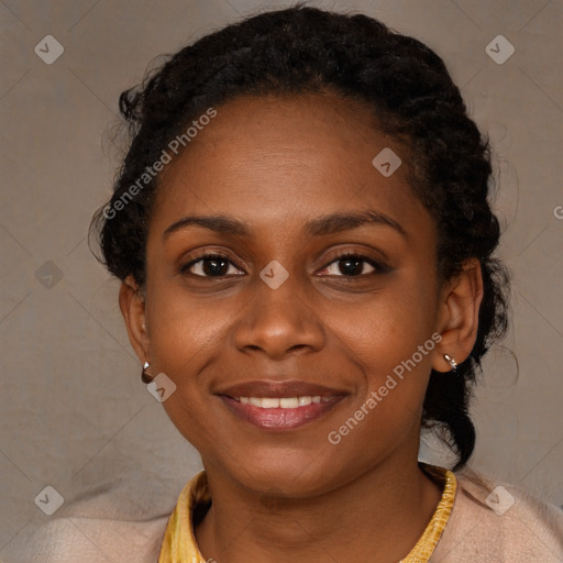 Joyful black young-adult female with long  brown hair and brown eyes