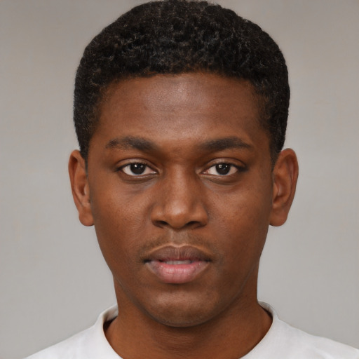 Neutral black young-adult male with short  brown hair and brown eyes
