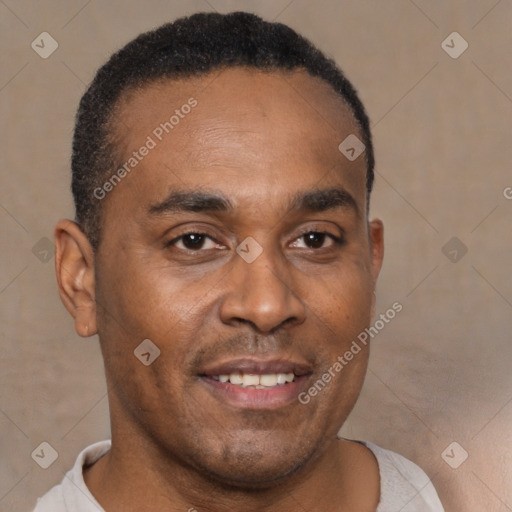 Joyful black young-adult male with short  brown hair and brown eyes