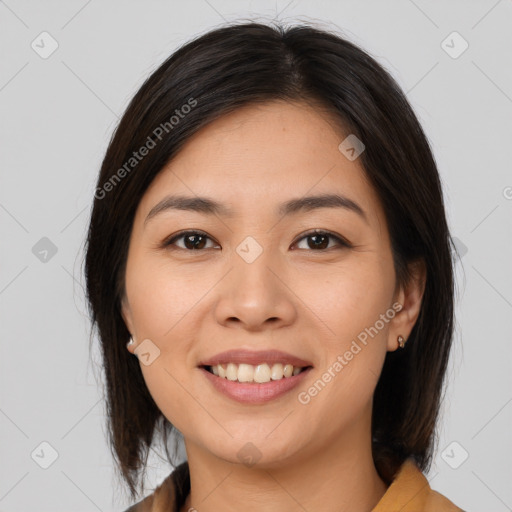 Joyful asian young-adult female with medium  brown hair and brown eyes