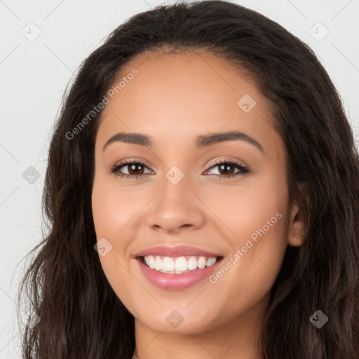 Joyful white young-adult female with long  brown hair and brown eyes