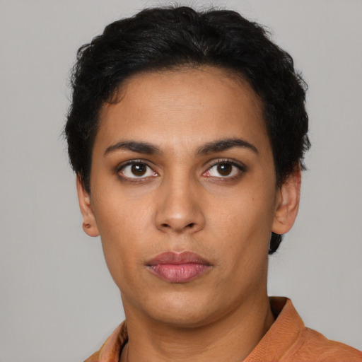 Neutral latino young-adult female with short  black hair and brown eyes