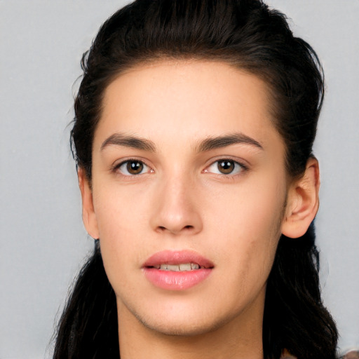 Neutral white young-adult female with long  black hair and brown eyes