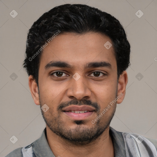 Joyful latino young-adult male with short  black hair and brown eyes