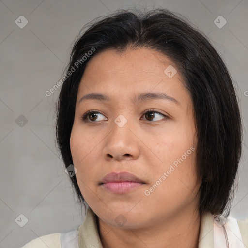 Neutral asian young-adult female with medium  brown hair and brown eyes