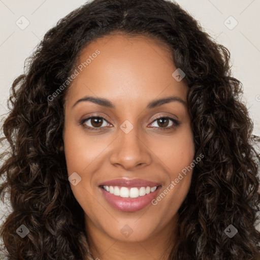 Joyful latino young-adult female with long  brown hair and brown eyes