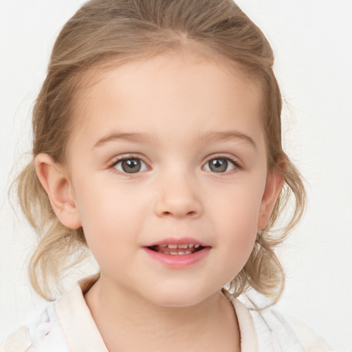 Joyful white child female with medium  brown hair and grey eyes