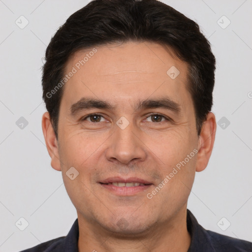 Joyful white adult male with short  brown hair and brown eyes