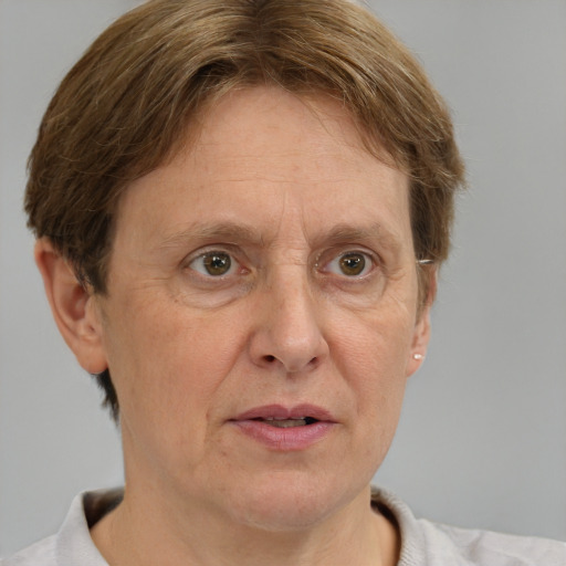 Joyful white middle-aged male with short  brown hair and brown eyes