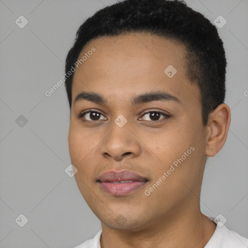 Joyful latino young-adult male with short  black hair and brown eyes