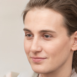 Joyful white young-adult male with medium  brown hair and brown eyes