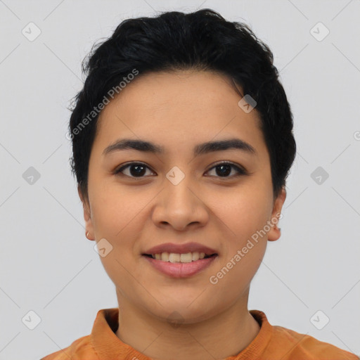 Joyful asian young-adult female with short  black hair and brown eyes