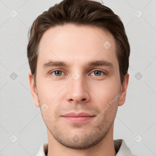 Neutral white young-adult male with short  brown hair and grey eyes